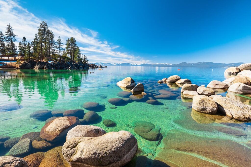 Lake Tahoe rocky shoreline in sunny day