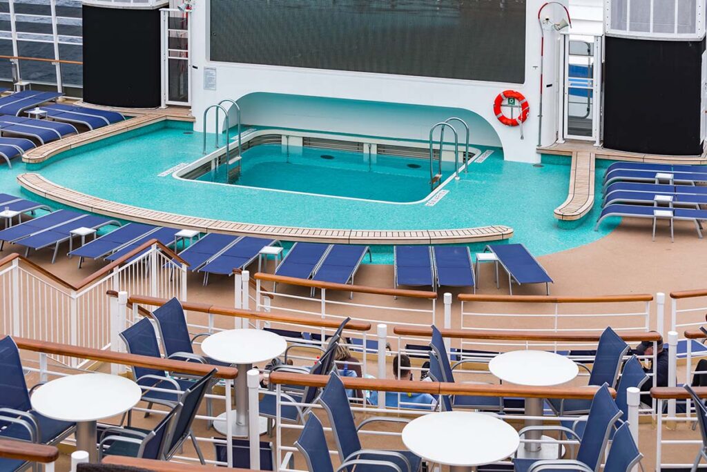 Large movie screen over swimming pool on cruise ship