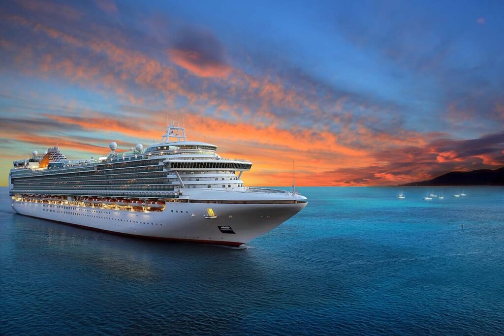 cruise ship sailing at dusk