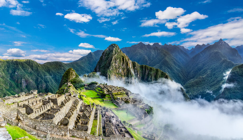 Overview of Machu Picchu, agriculture terraces and Wayna Picchu peak in the background