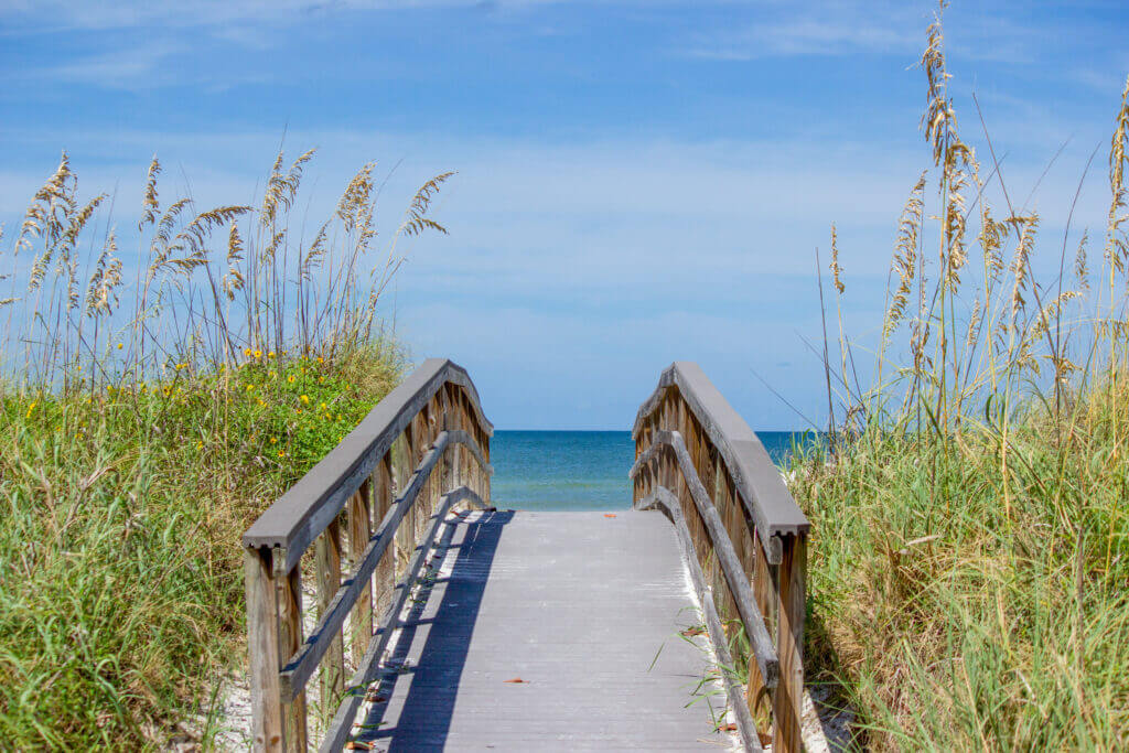 Bridge to Beach. Beach, Destination, Healthy Lifestyle, Relaxing, Scenic, Tourism, Travel and Vacation Concepts.