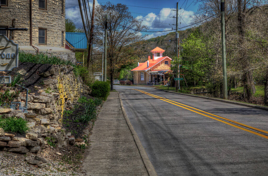 299 North Main Street Eureka Springs Arkansas Photo taken April 21, 2021 North Arkansas Railroad built this depot in 1913, now restored and used as a tourist railroad. The railroad changed hands several times over the years closing down in 1961. At one time the North Arkansas railroad extended 360 miles from Joplin Missouri to Helena Arkansas. The depot was used in the CBS miniseries inThe Blue and the Gray in 1982.