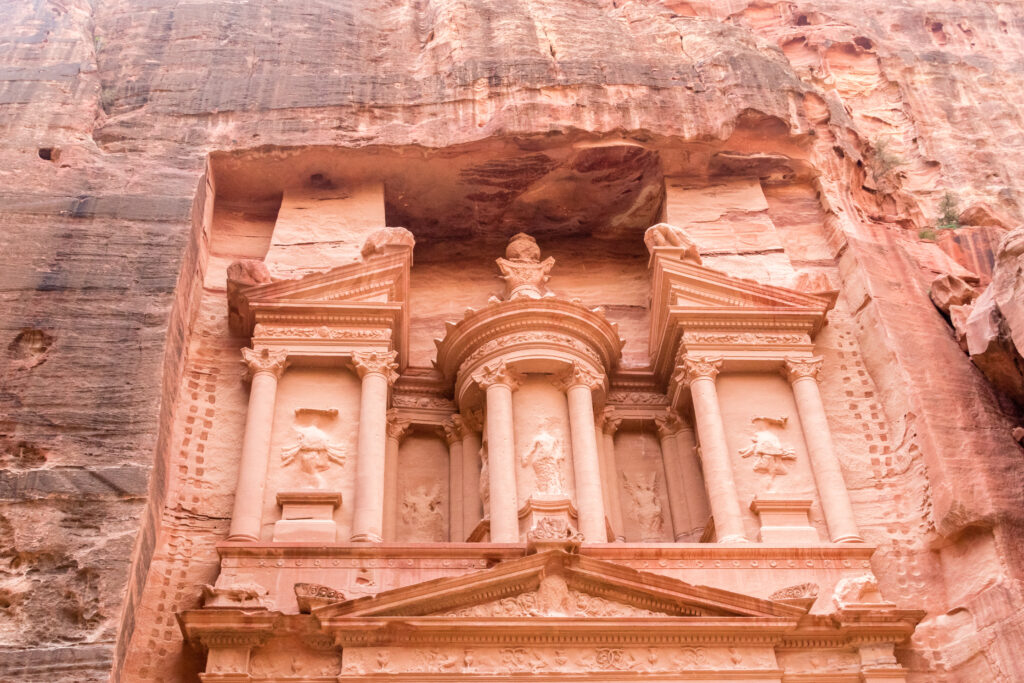 Close-up of  facade Al-Khazneh with urn in Petra Jordon. Petra is UNESCO World Heritage Site and is one of New7Wonders of the World.