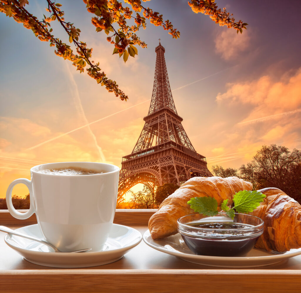 Coffee with croissants against Eiffel Tower in Paris, France