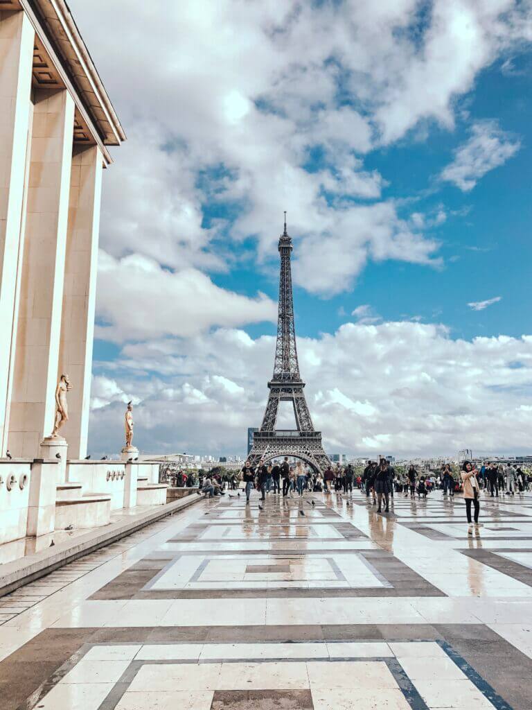 People walking near eiffel tower