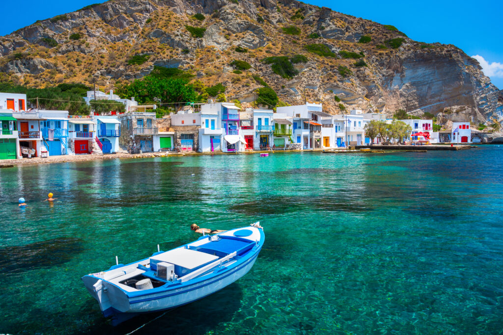 Scenic Klima village (traditional Greek village by the sea, the Cycladic-style) with sirmata - traditional fishermen's houses, Milos island, Cyclades, Greece.