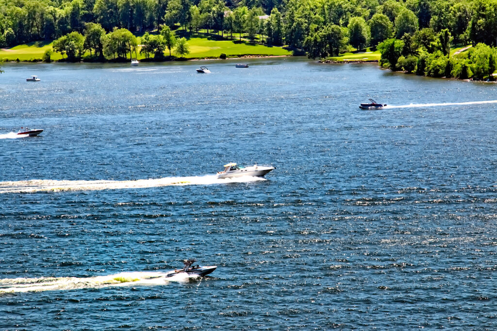 Speed boats in full throttle in Lake of Ozark USA