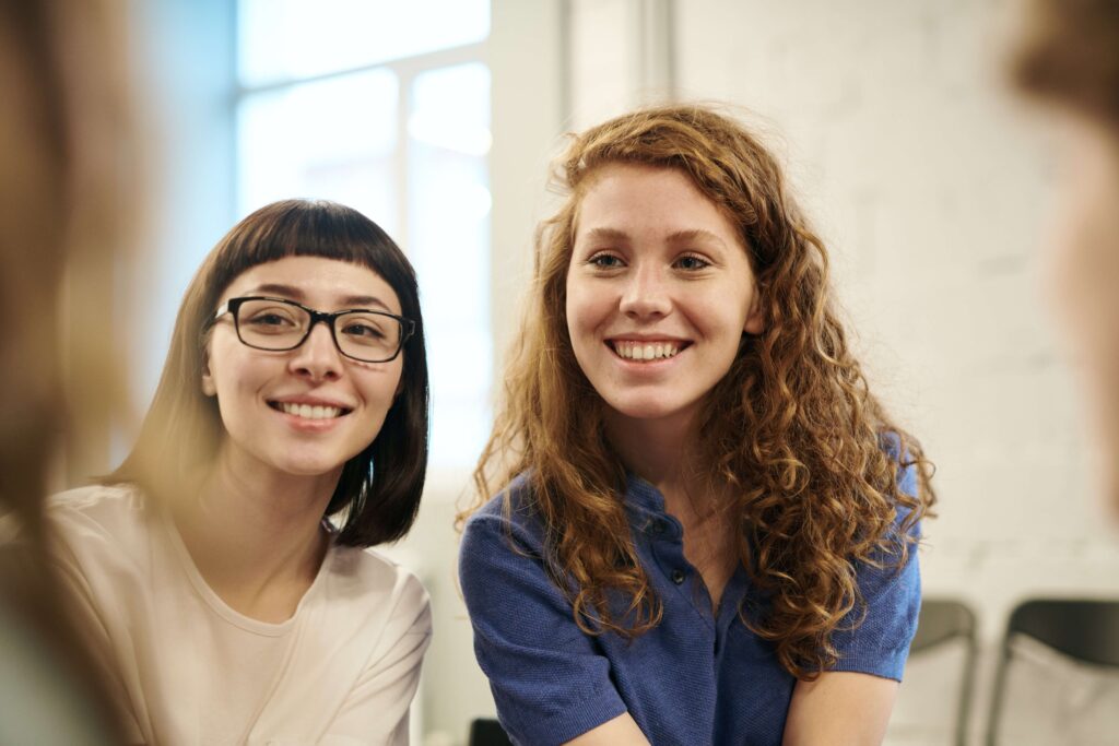 Two women with different hairstyles