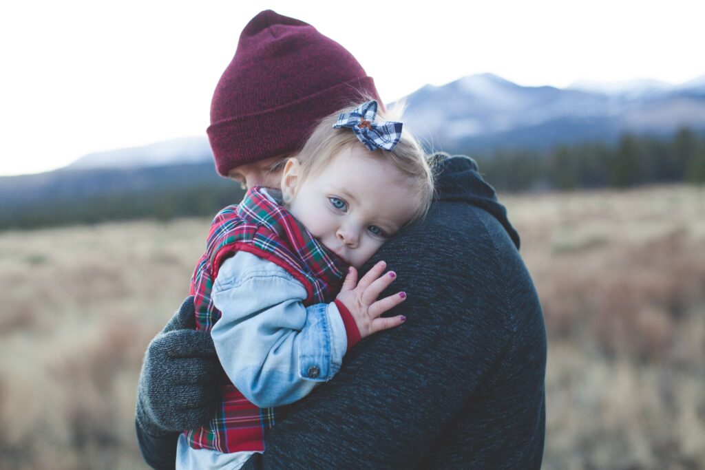 A father hugging his daughter