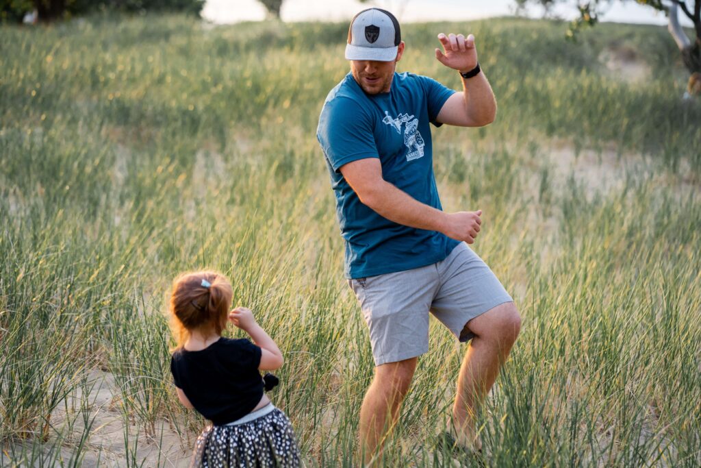 A father dancing with his daughter