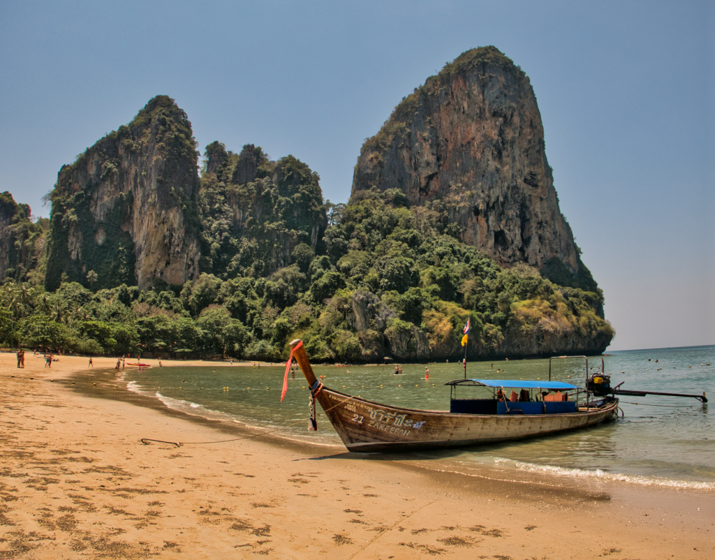 A boat docked on the railay beach