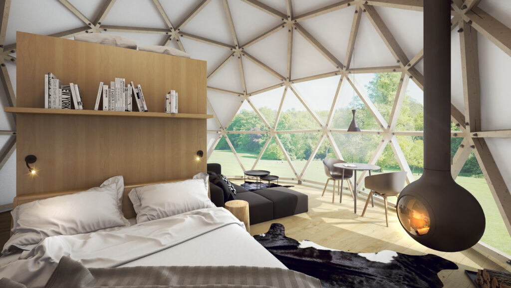 Geodesic dome tent as hotel. Fabric and wood framed yurt structures for, luxurious, upscale glamping