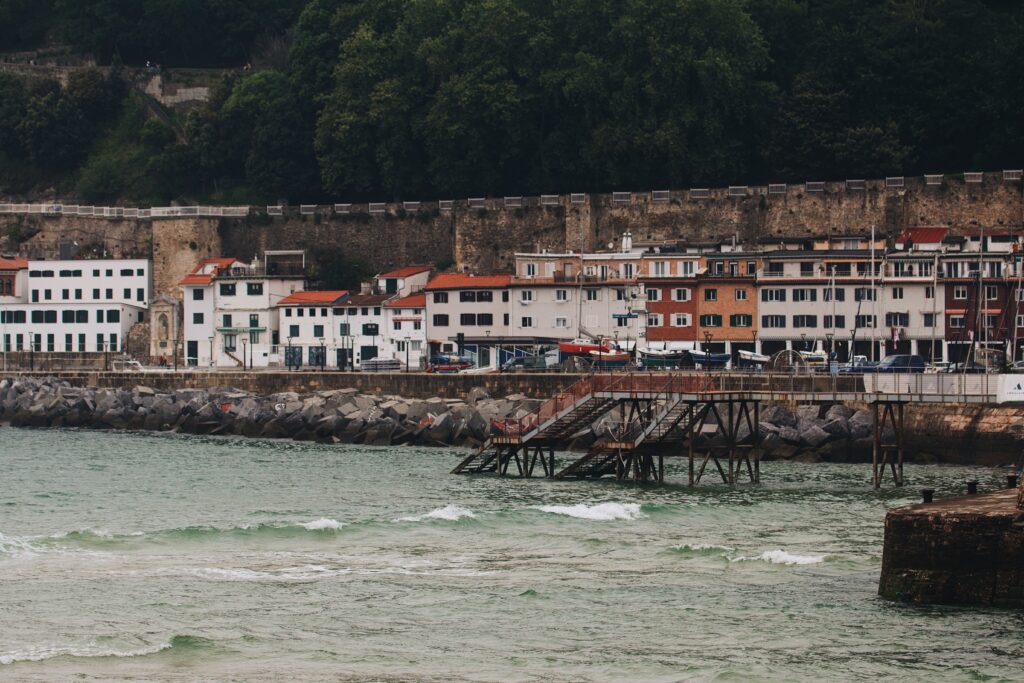 Houses in row near ocean san sebastian spain