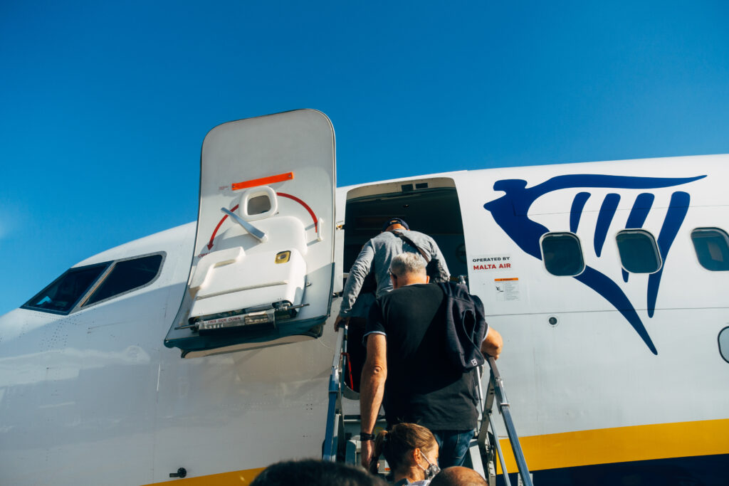 People boarding an airplane