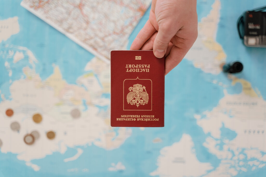 Close up shot of a person holding a passport