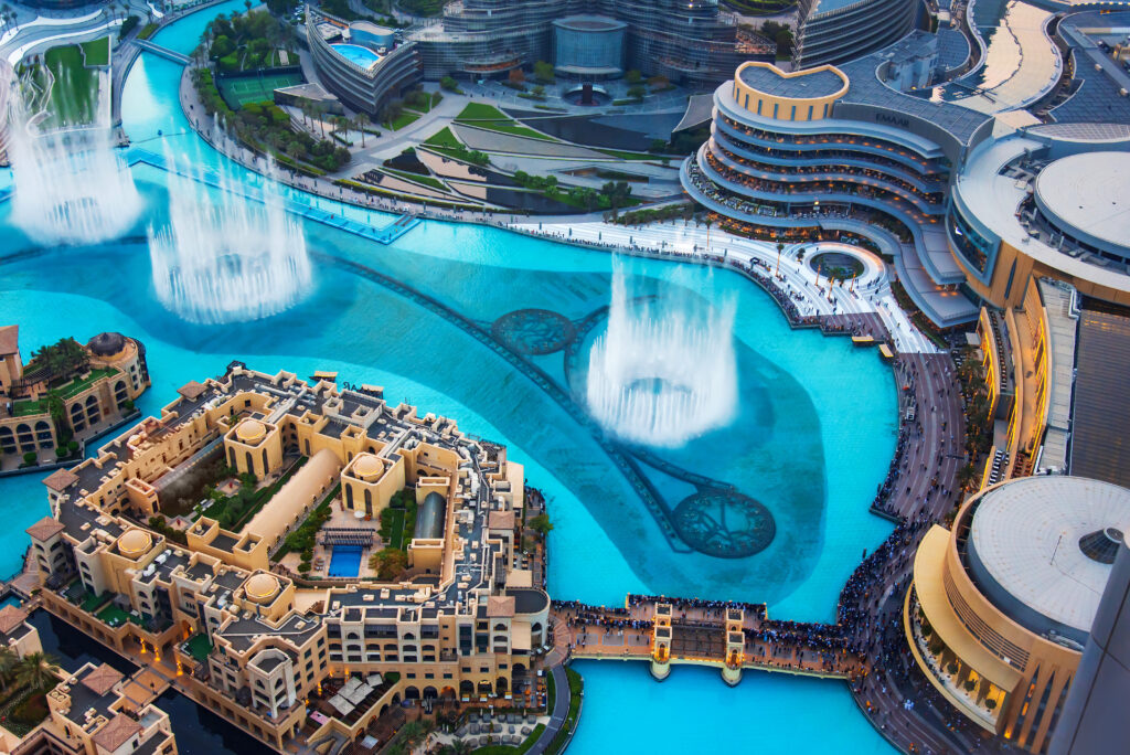 Dubai mall fountain and modern downtown buildings