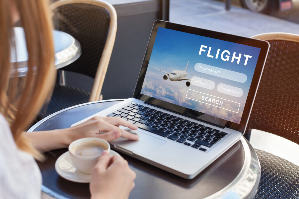 flight search on internet website, travel planning concept, airplane tickets online