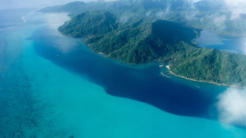 Flying over Huahine Blue Lagoon In French Polynesia