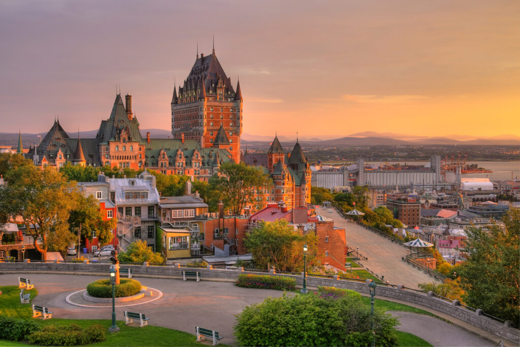 Frontenac Castle in Old Quebec City in the beautiful sunrise light. High dynamic range image. Travel, vacation, history, cityscape, nature, summer, hotels and architecture concept