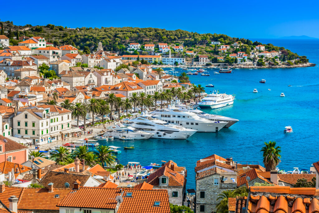 Hvar town mediterranean landscape. / Aerial view at Hvar town in Southern Croatia, famous luxury travel destination in Europe, Mediterranean.