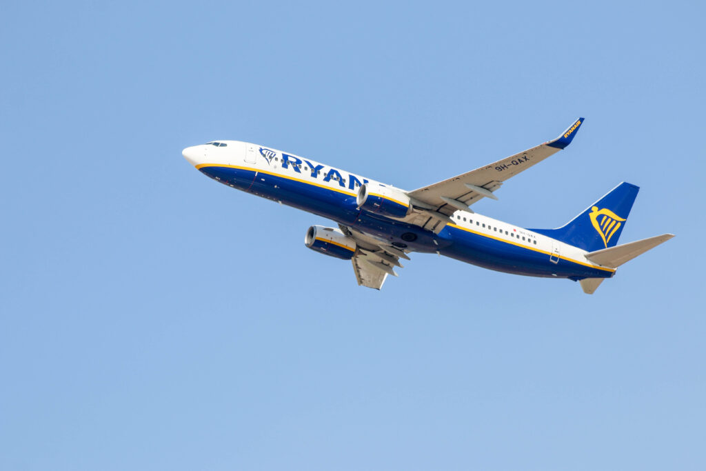 Plane flying on clear sky