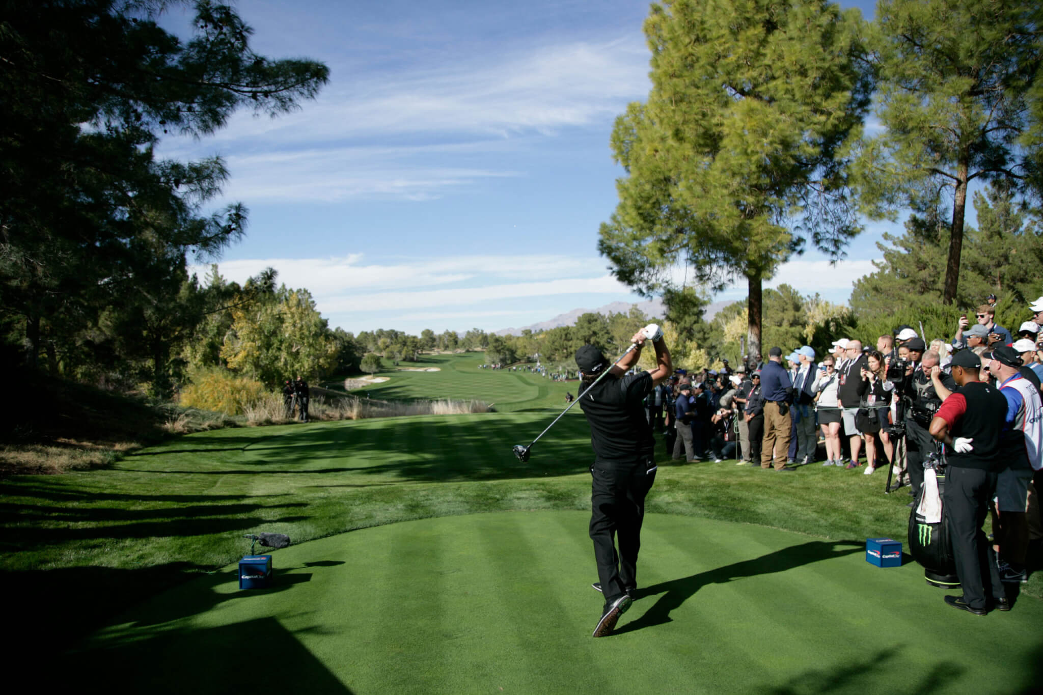 Phil Mickelson tees off at the third hole of his pay-per-view winner-take-all $9 Million dollar golf match against longtime rival Tiger Woods at Shadow Creek Golf Course in Las Vegas, Nevada on November 23, 2018.