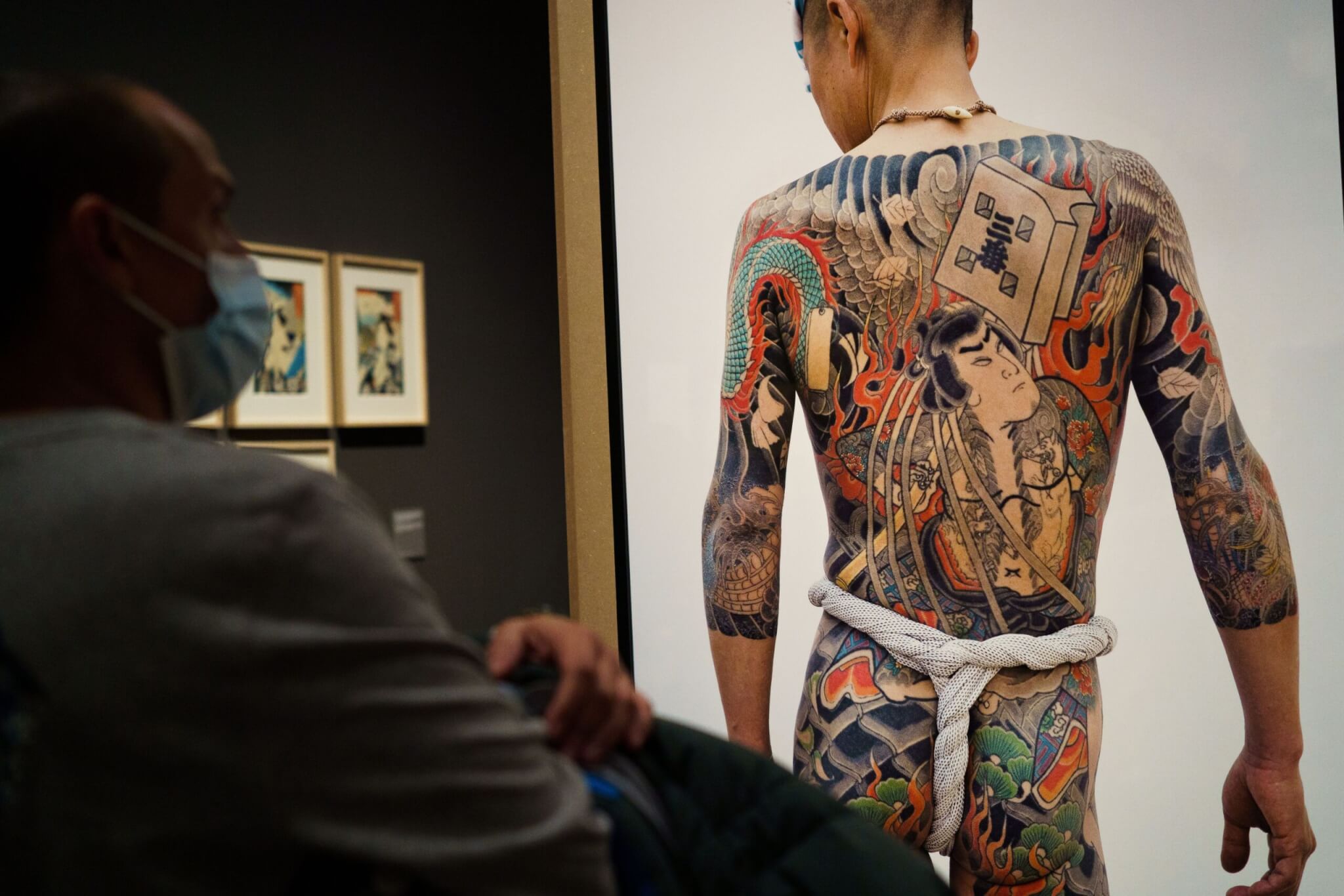 Tattooed man by the artist horikazu seen during the "Arte Bajo La Piel" exhibition at the CaixaForum centre.