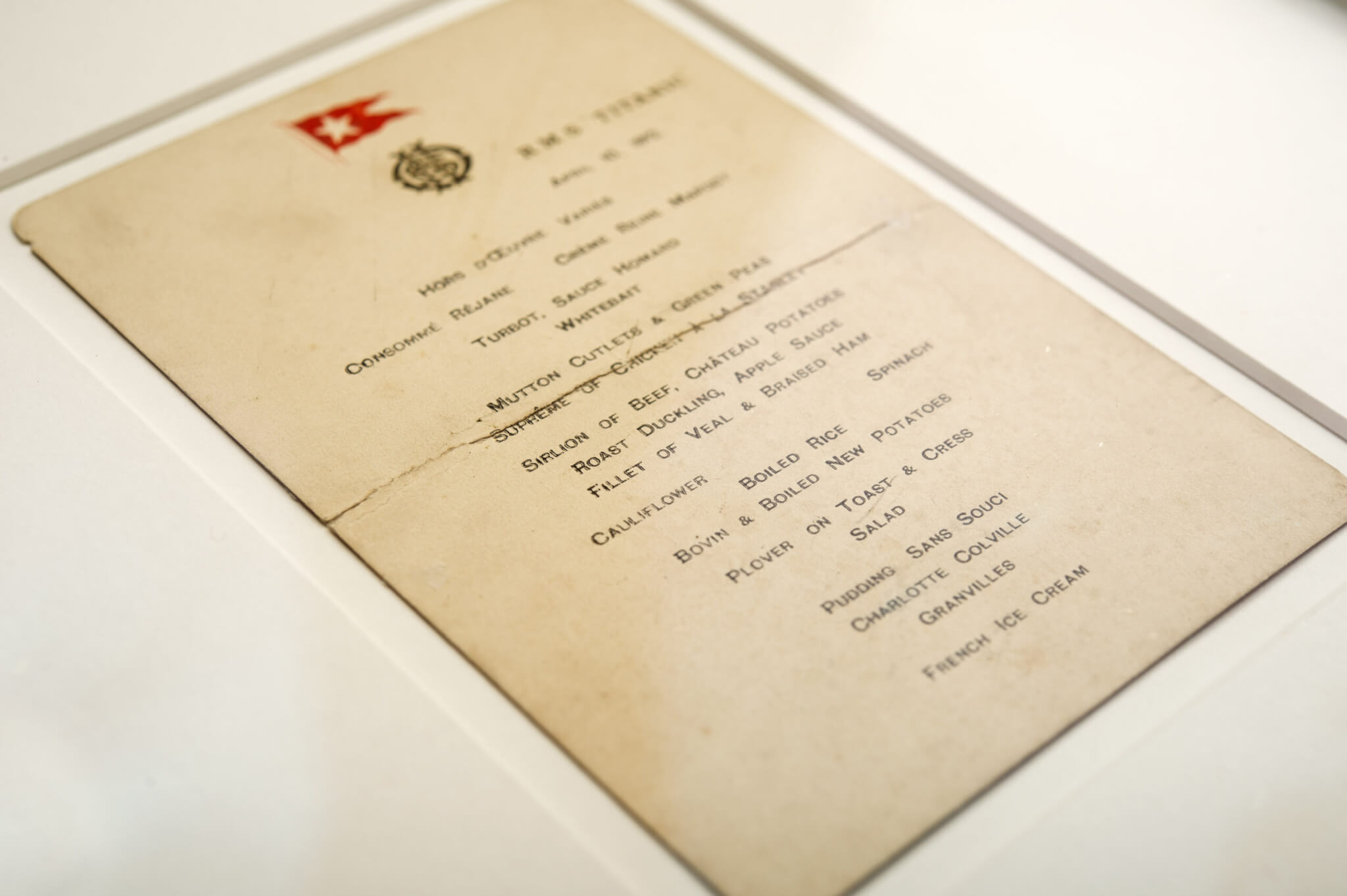 Pictured: Elsewhere in the sale, a rare first class dinner menu for April 10, 1912 - the day the liner left Southampton on her doomed maiden voyage, sold for £50,000.

A pocket watch that stopped at the very moment its owner went down with the Titanic has sold at auction for £122,000.

Oscar Woody perished along with 1,520 others when the ill-fated ship struck an iceberg and sank in the Atlantic in 1912.
Elsewhere in the sale, a rare first class dinner menu for April 10, 1912 - the day the liner left Southampton on her doomed maiden voyage, sold for £50,000.