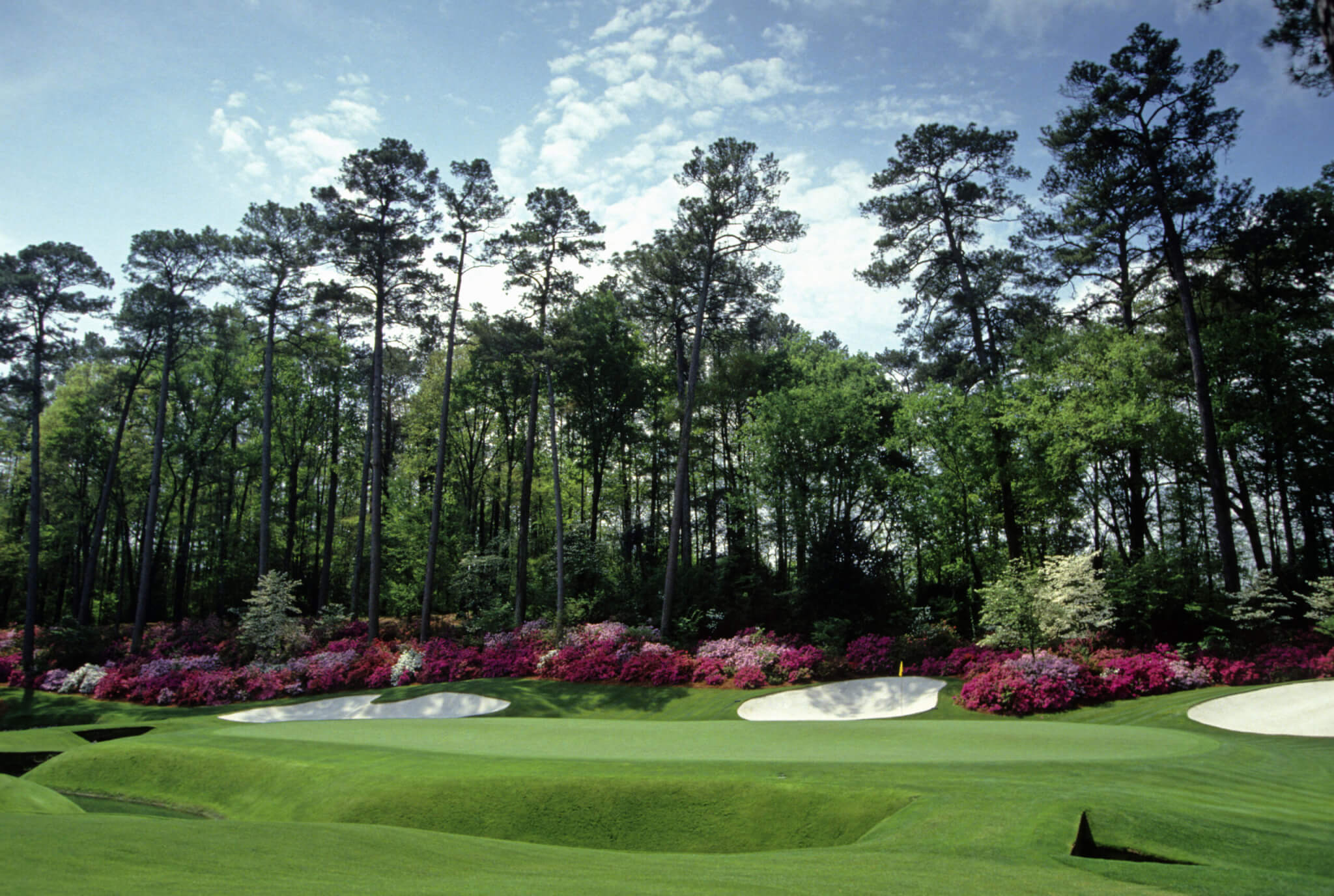 April 1991: General view of the 13th hole at Augusta National Golf Course during the US Masters. The Augusta National Golf Club, located in Augusta, Georgia was founded by Bobby Jones and Clifford Roberts on the site of a former indigo plantation, the course was designed by Jones and Alister MacKenzie. AP10145907; .