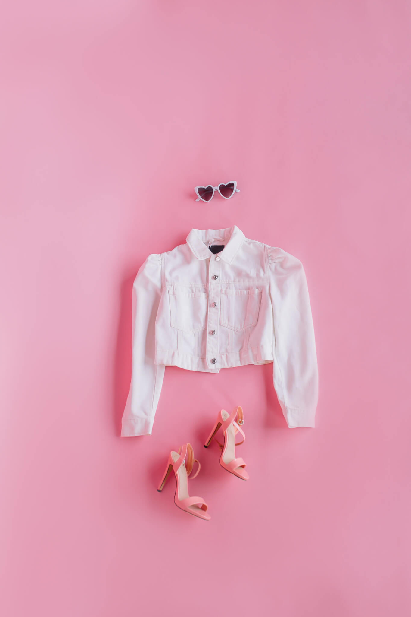 clothes for barbie suit shoes on a pink background