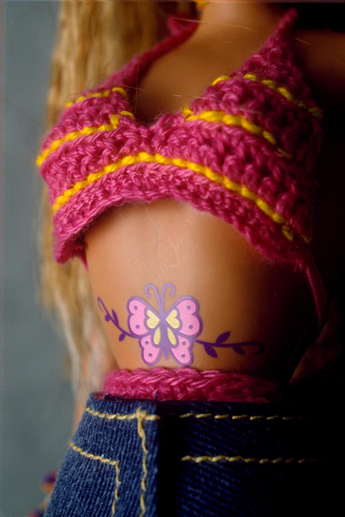 NEW BARBIE DOLL WITH BUTTERFLY TATTOO