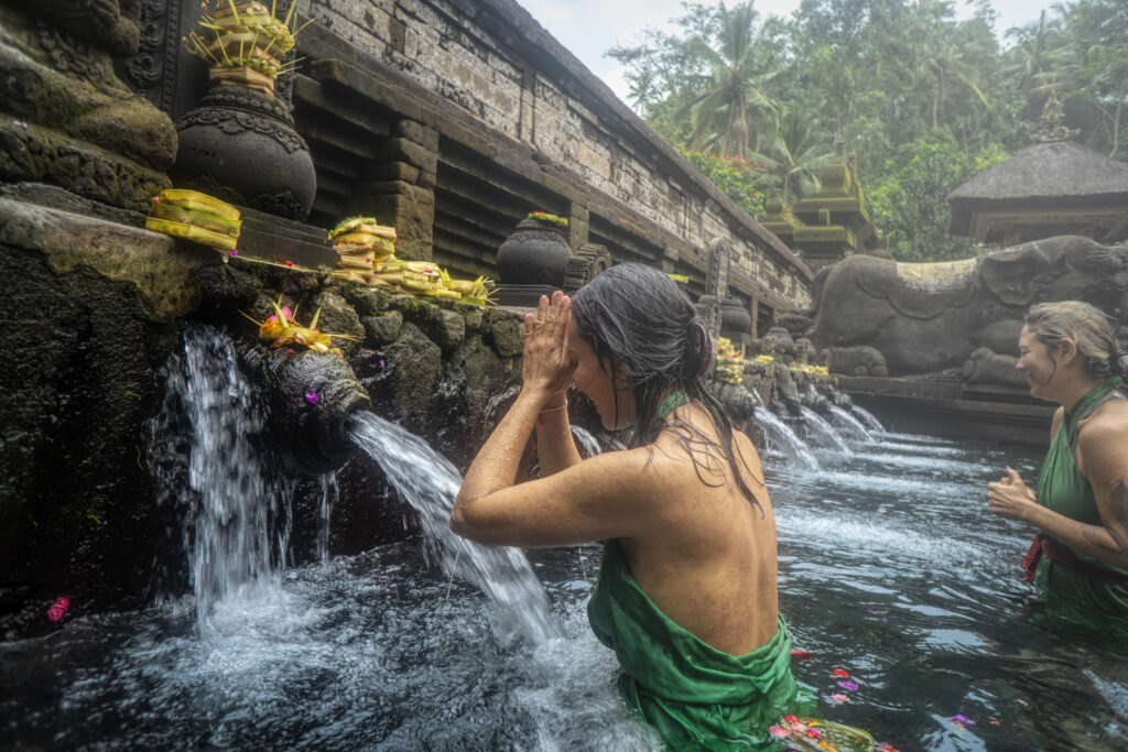 Woman standing in front of flowing water