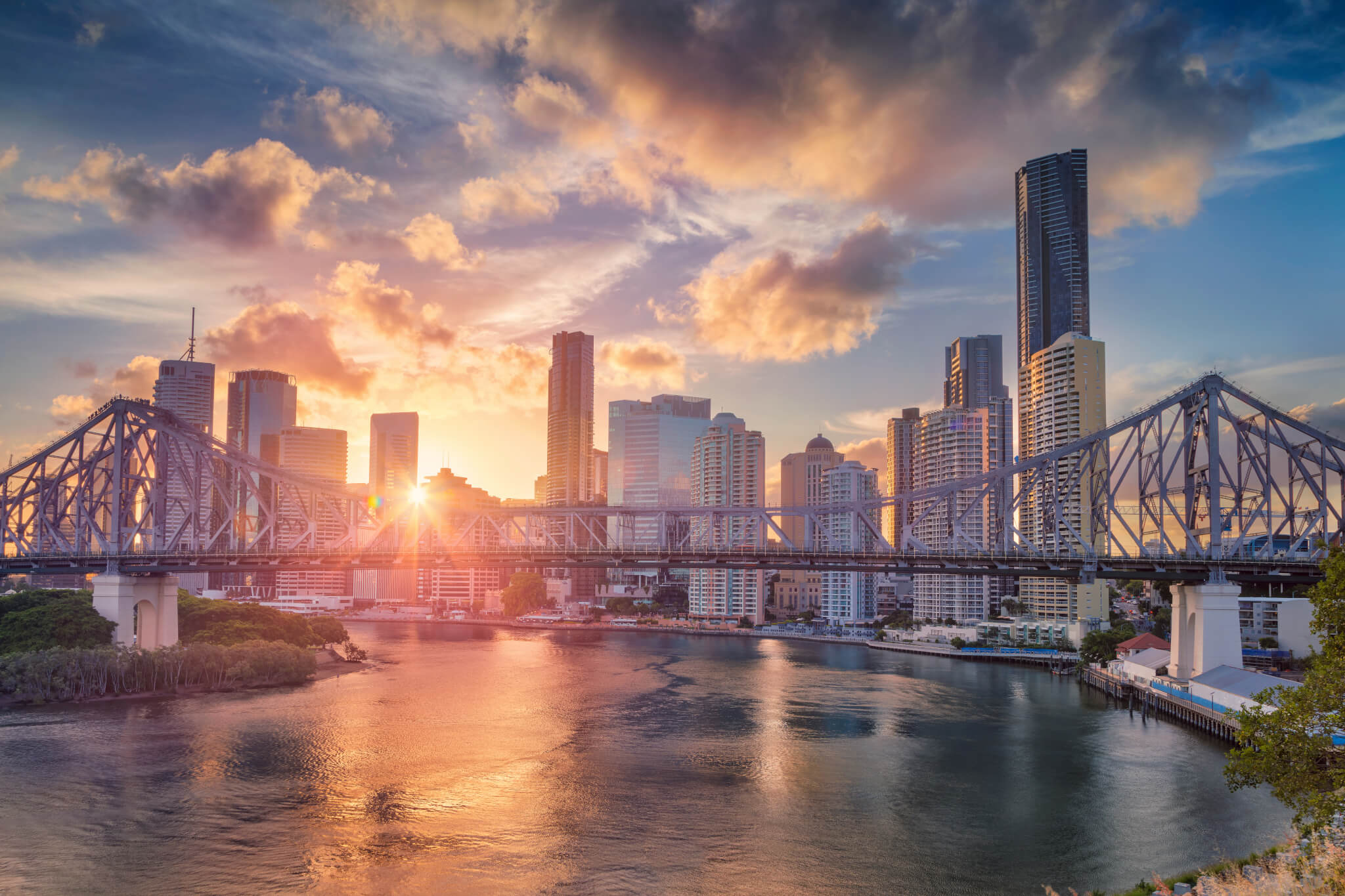 Brisbane. Cityscape image of Brisbane skyline, Australia with Story Bridge during dramatic sunset.