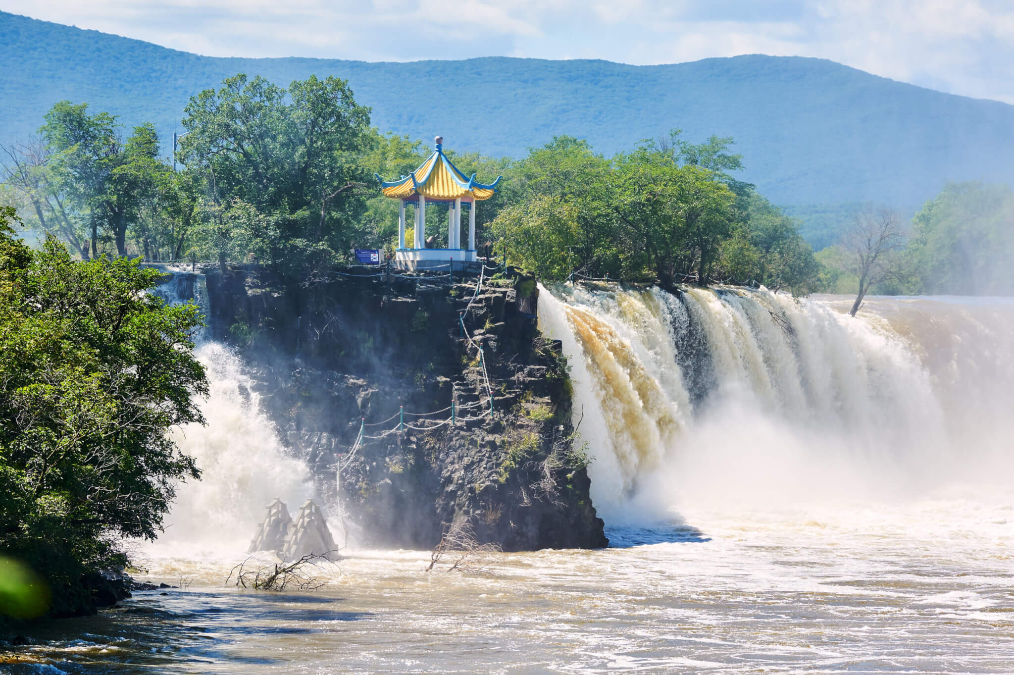 Ching-po Lake waterfalls of China sunset landscape.