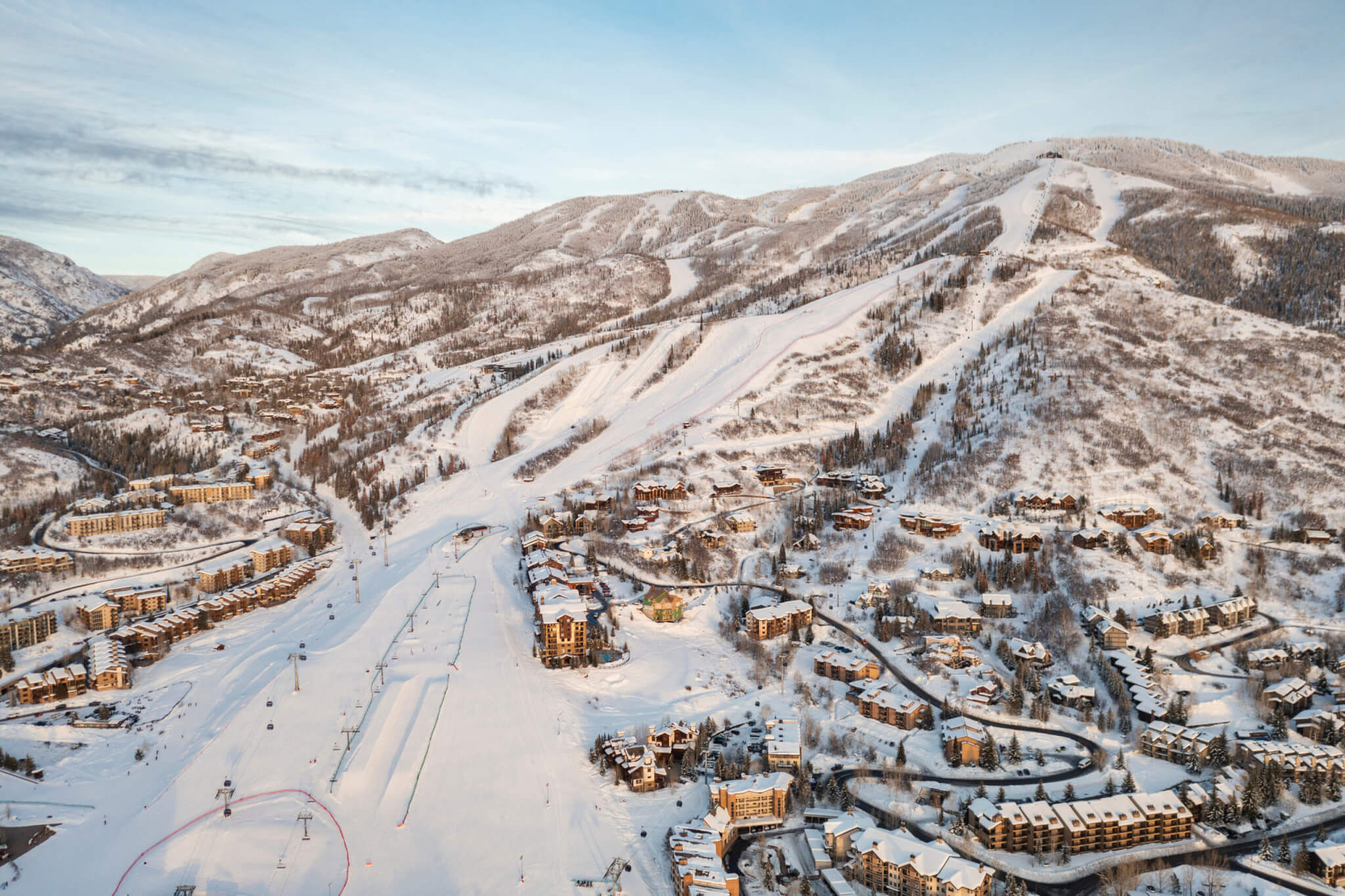 Aerial view of ski resort and mountain town of Steamboat Springs, Colorado with winter landscape and Mt. Werner