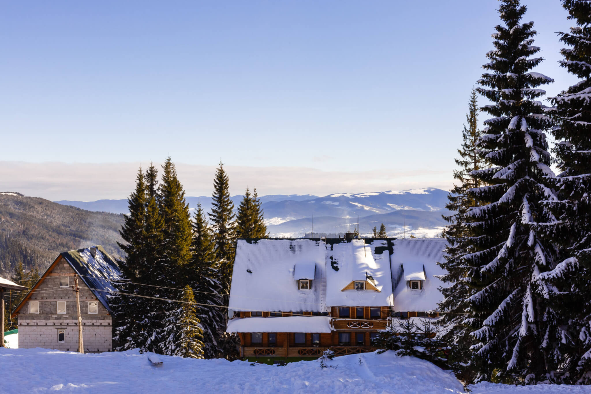 Beautiful colorful landscape in Snowmass - a ski resort with background of small residential area  huts surrounded by trees HDR image in Aspen Colorado