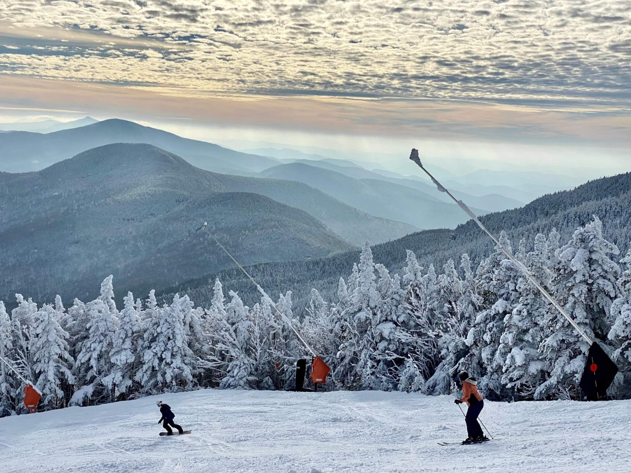 Beautiful mountains view with clouds at snow day at the Stowe Mountain Ski resort Vermont - December 2020