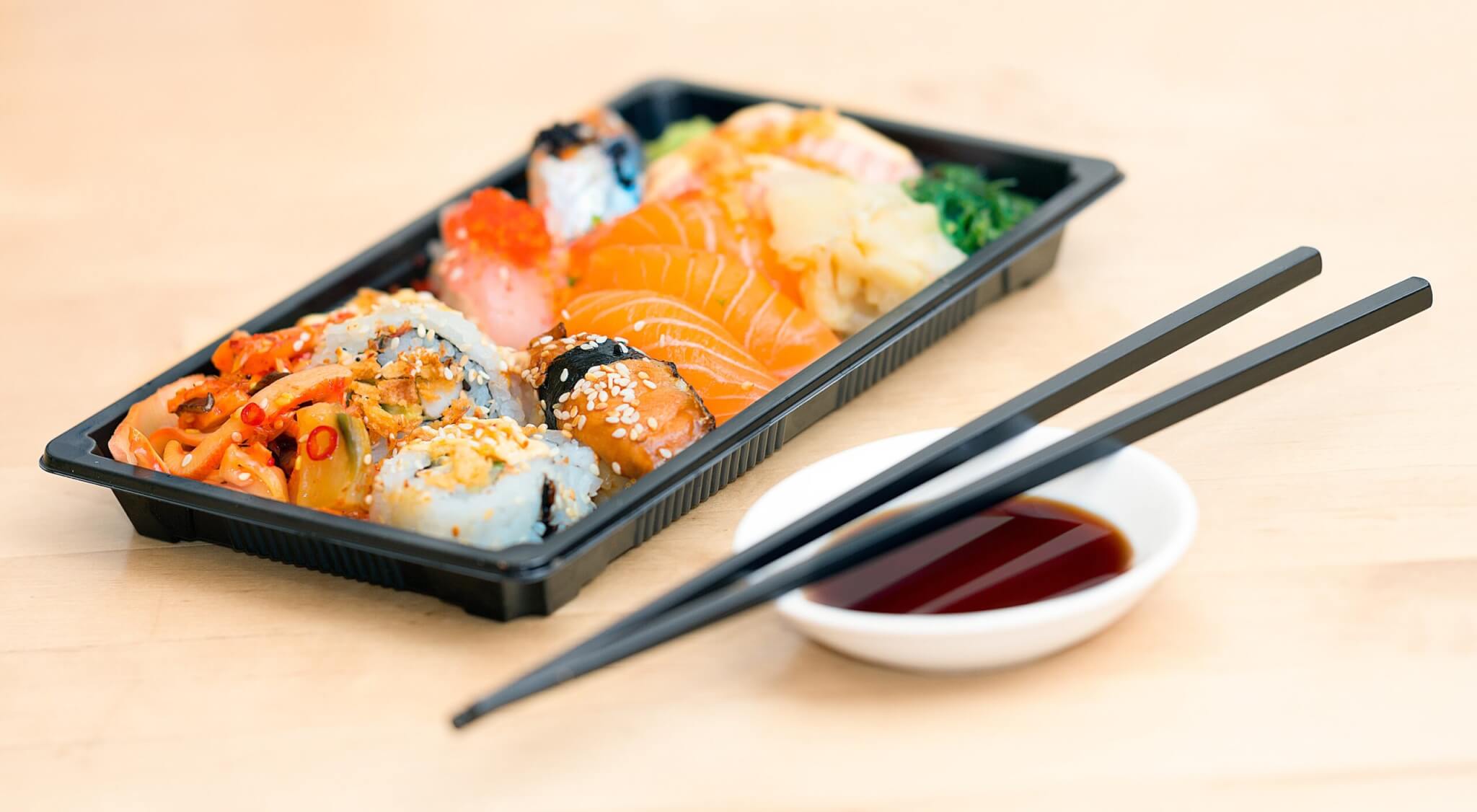 Close up photo of sushi served on table