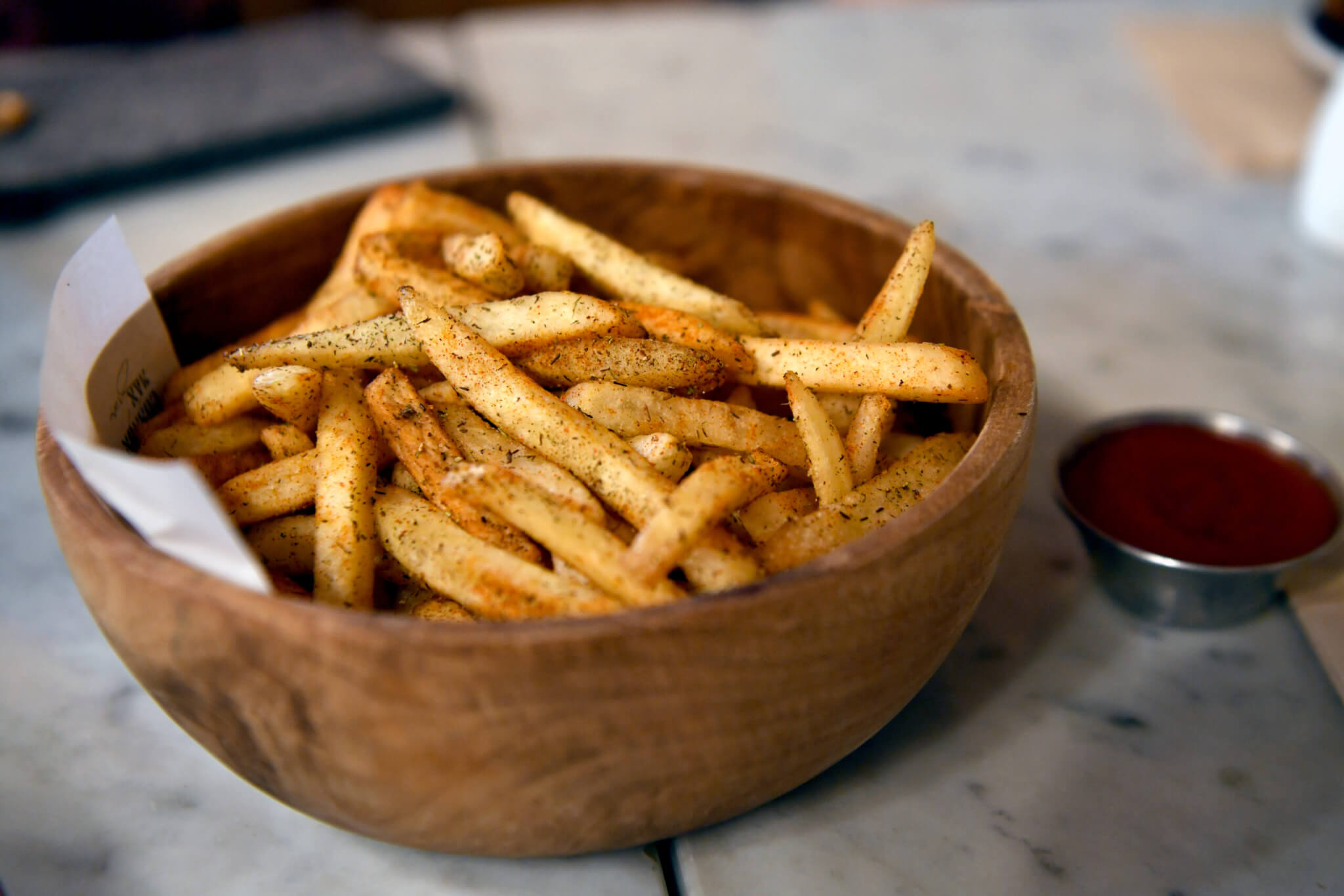 French fries served in a bowl in a restaurant