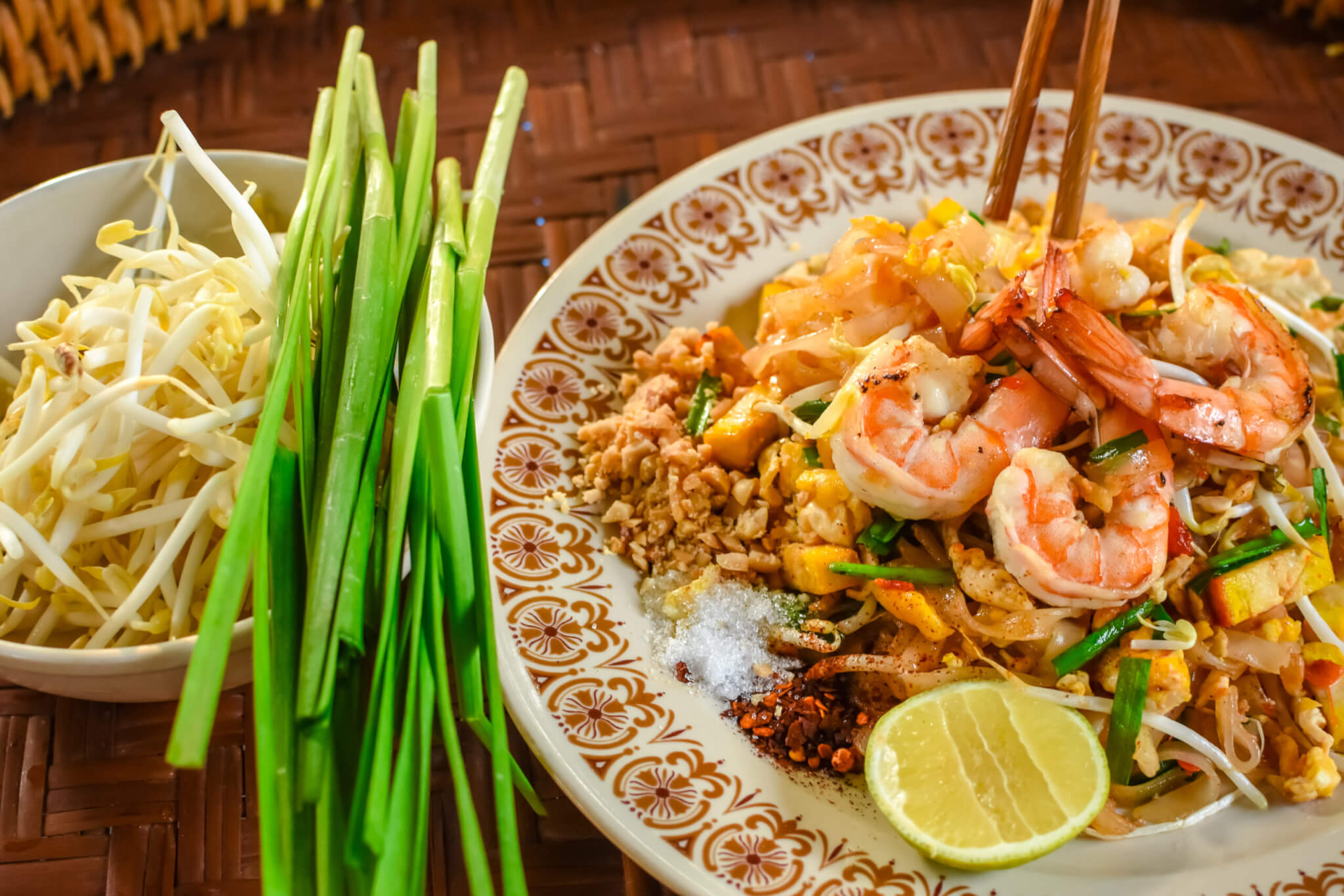 Thai Stir-fried rice noodles (Pad Thai) with shrimp and vegetables. One of the most famous food in Thailand. Thailand traditional dish.