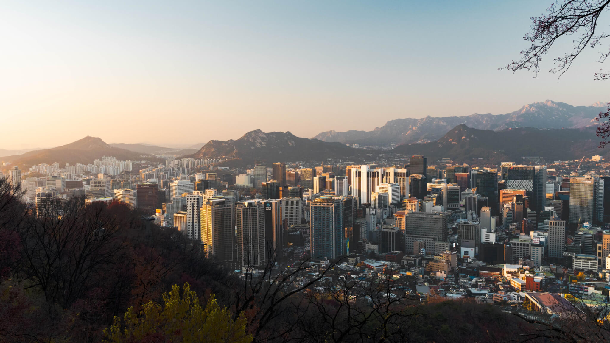 Urban area surrounded by mountain range