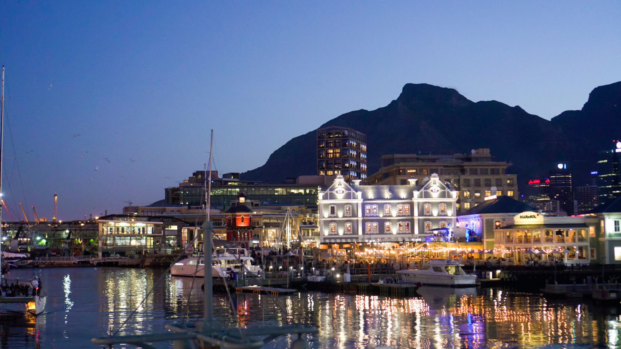 Cape Town beautiful scene of Victoria waterfront of South Africa at dusk sunset evening light reflection