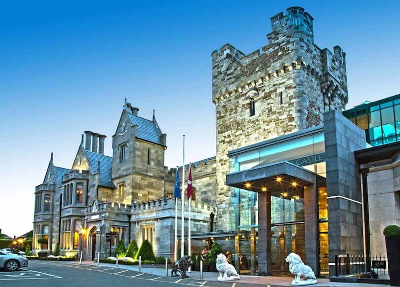 Outside of luxury style hotel in Dublin, the exterior looks like a castle from the 1900's