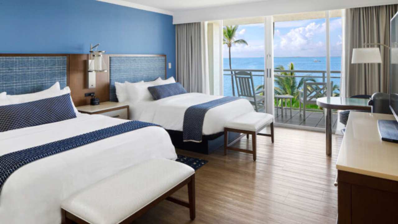 two queen bed hotel roof with ocean view at the reef house resort 