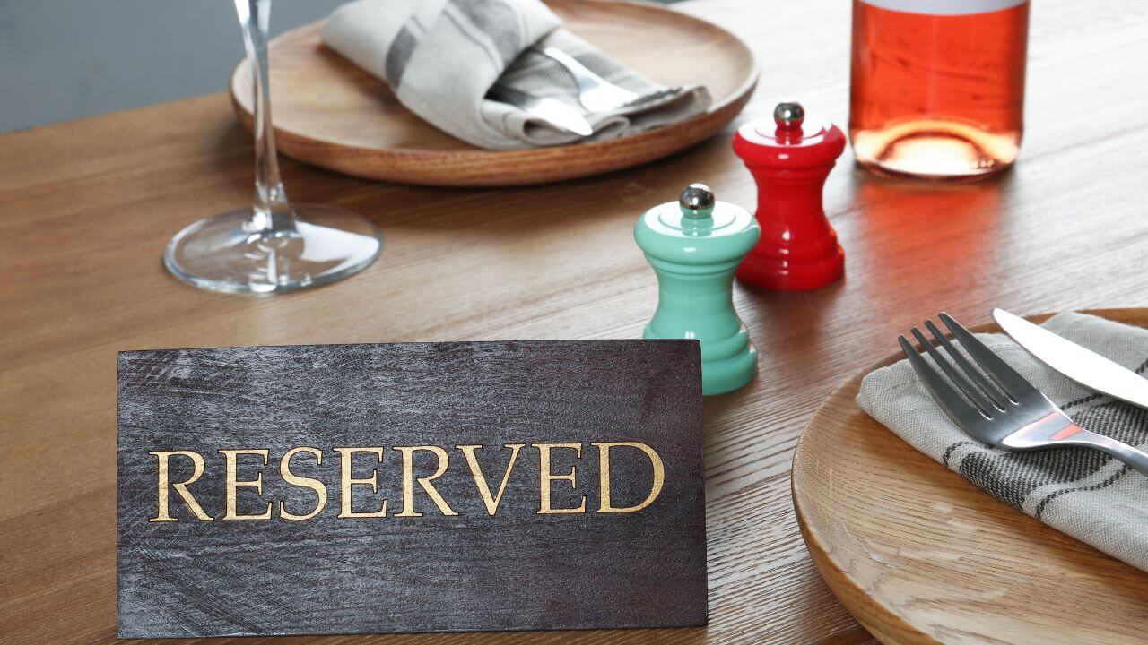 reserved sign at a dinner table