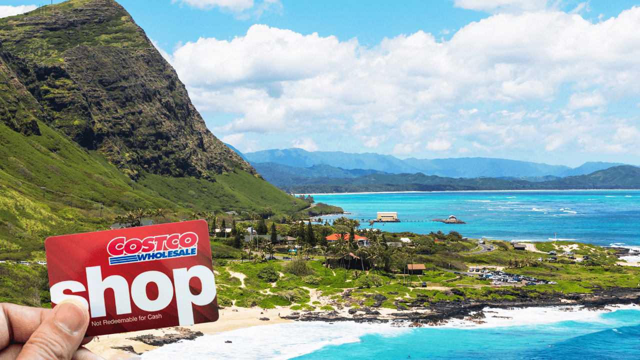 oahu island package with a picture of someone holding a digital costco shop card which members get in return when they book this package deal 