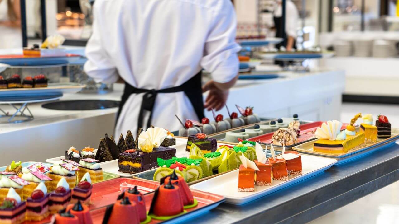 multiple desserts out for display at a buffet