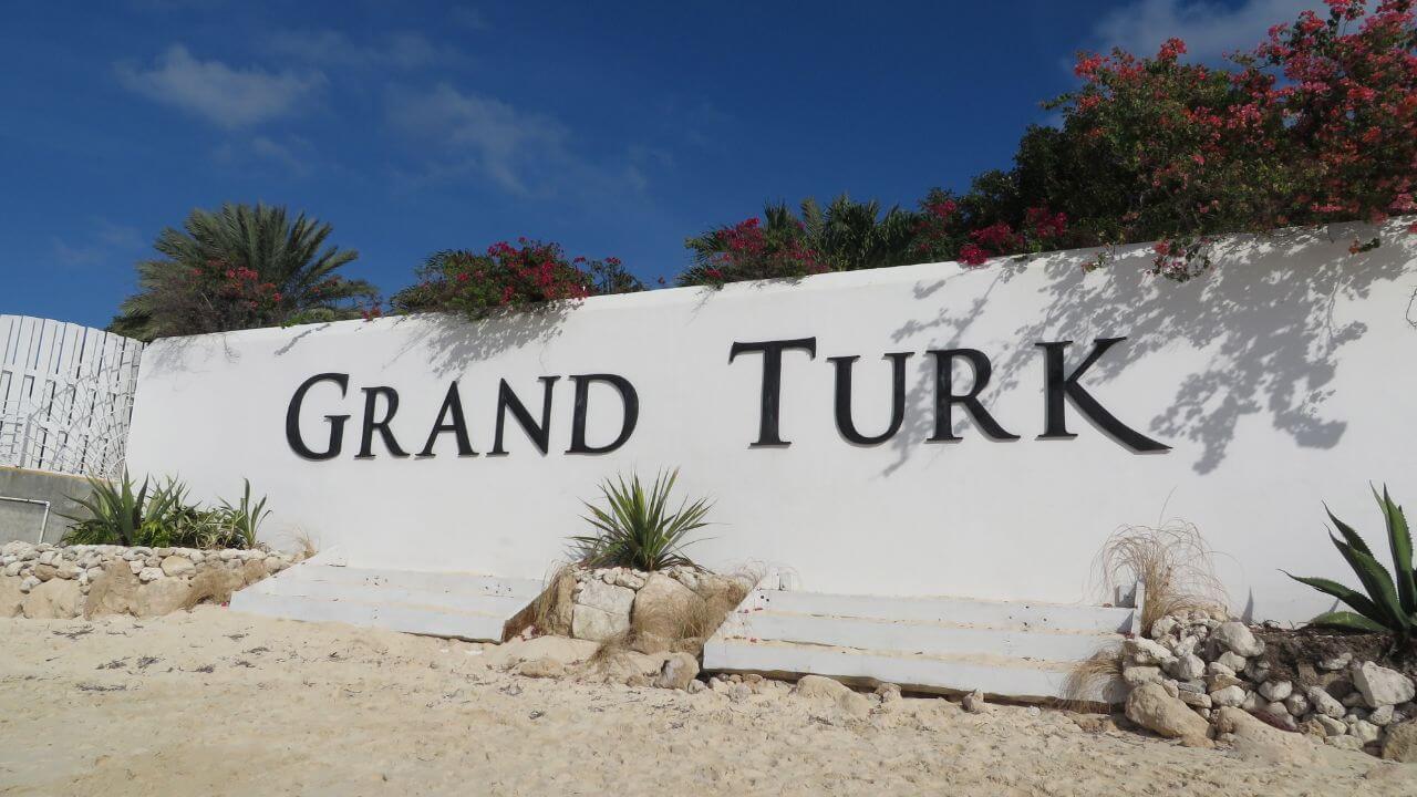 sing that says grand turk with sand