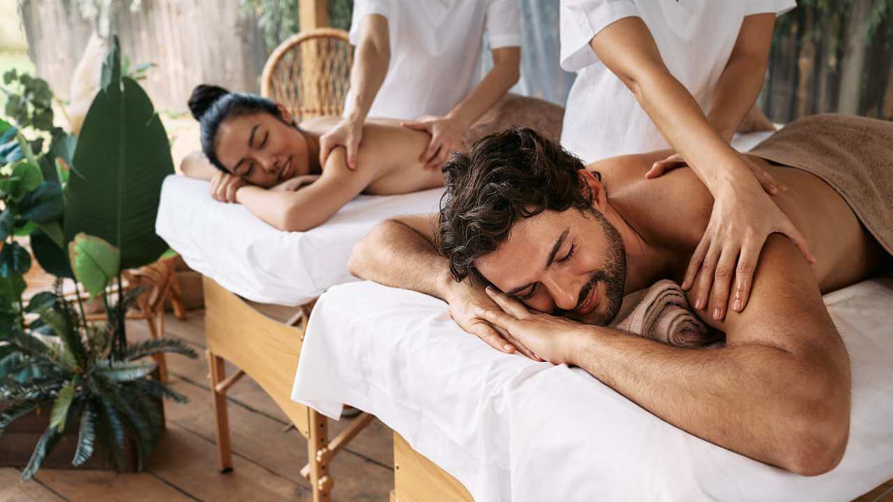 couple getting a relaxing massage while on vacation