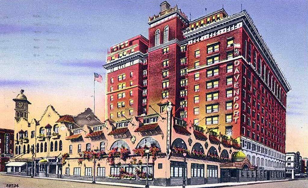 Cartoon picture of the Davenport hotel from back in the day - the exterior of the building is red brick 